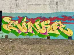 Chrome silver dripping graffiti letters